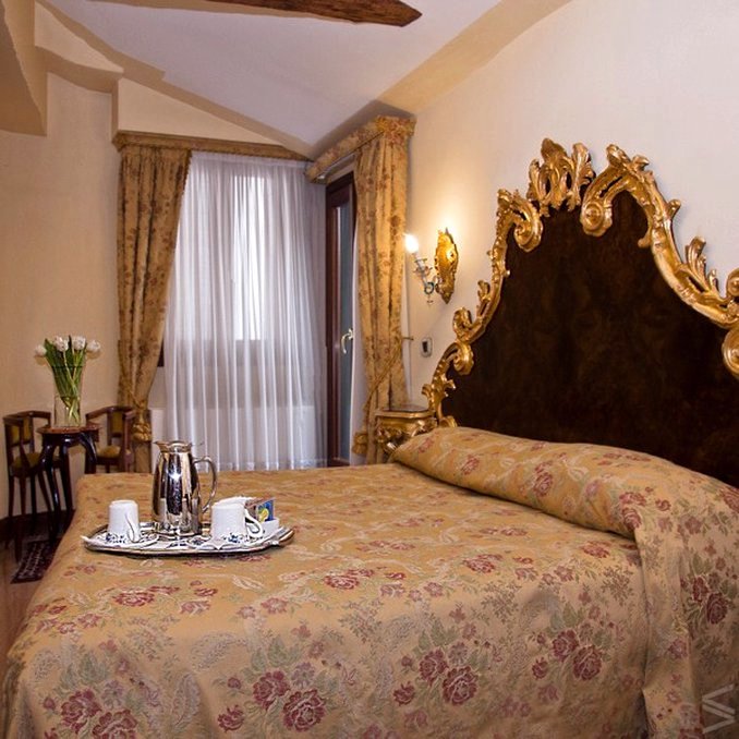 桑卡西亚诺小住酒店(Hotel San Cassiano - Residenza d'Epoca Ca' Favaretto)