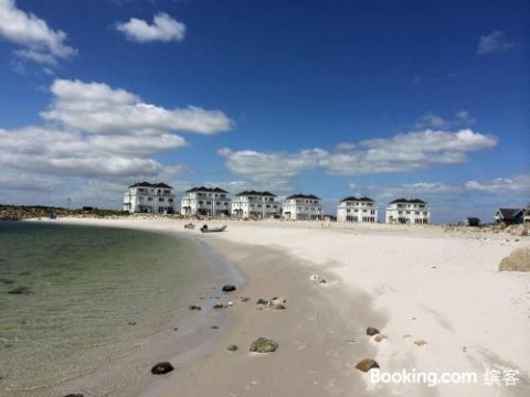 Ferienhaus-Strand-Hus-by-Seeblick-Ferien-Oro-Direkt-am-Strand