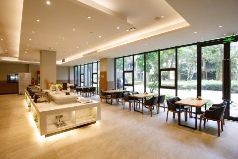 隅花原设计酒店(海口美兰机场鸿洲江山店)