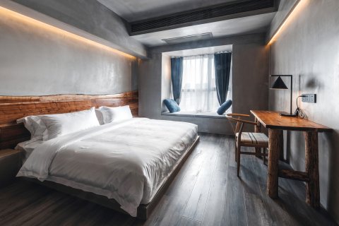 泥曲酒店(遂宁万达广场政务服务中心店)