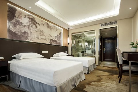 天友大酒店(重庆两路口地铁站儿童医院店)