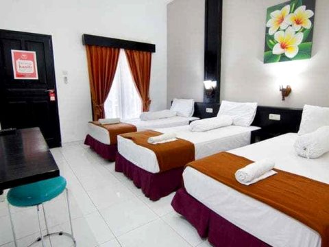 普哇加达拉雅西芭图尼达酒店(Nida Rooms Purwakata Raya Cibatu)