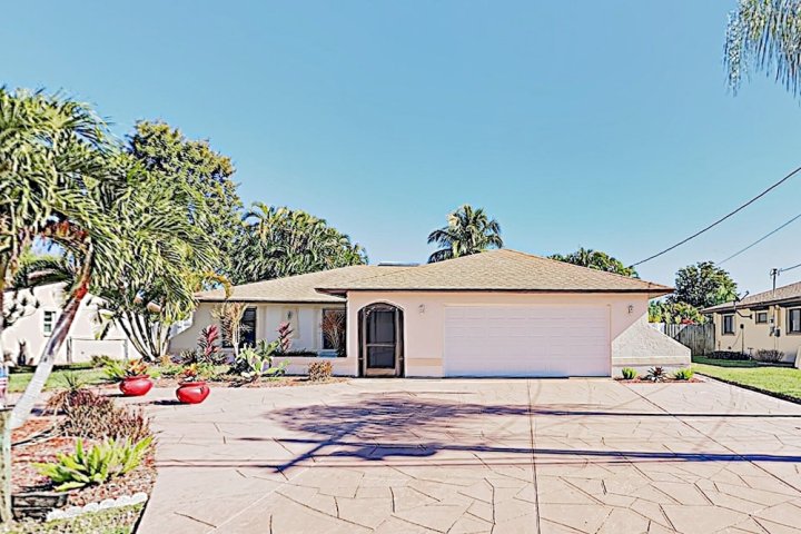 New Listing! Sparkling W/ Caged Pool & Lanai 3 Bedroom Home