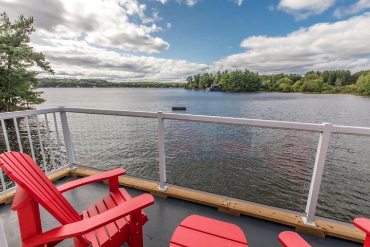 Fly by Rosseau Sunset View Cottage, Boathouse + Bunkies on Lake Rosseau