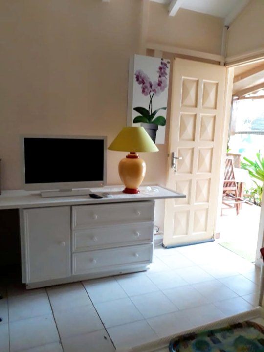 Bungalow with One Bedroom in Saint-Francois, with Shared Pool, Enclosed Garden and Wifi