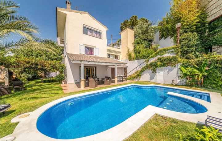 Nice Home in St. Cebria de Vallalta with 6 Bedrooms