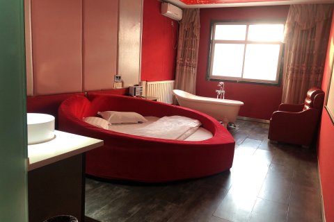 临汾唯爱精选主题公寓