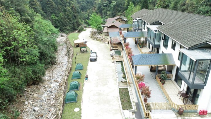 归心谷温泉水床房3高端温泉机麻团建窦圌山景区特色民宿