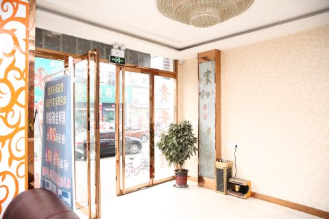 贵安商务宾馆(嘉祥一中萌山校区唐宁街店)