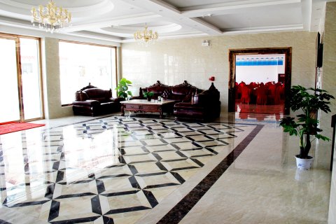 理塘轩源大酒店