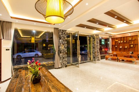 傣越风情假日酒店(西双版纳曼听公园店)