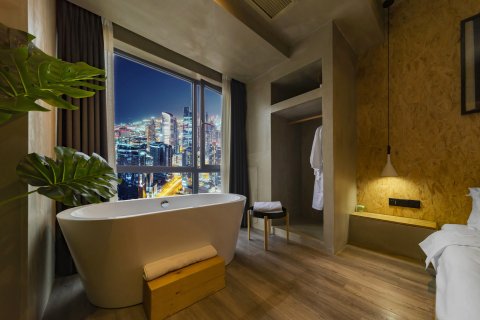 泥曲酒店(遂宁万达广场政务服务中心店)