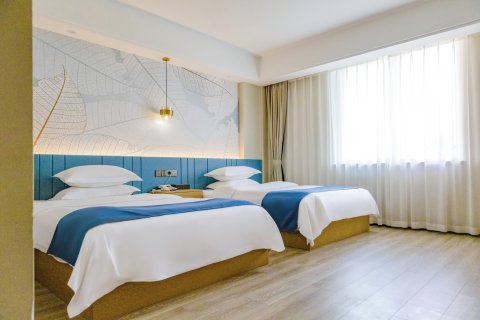 北川尔玛假日酒店(北川中学耍都商业广场店)