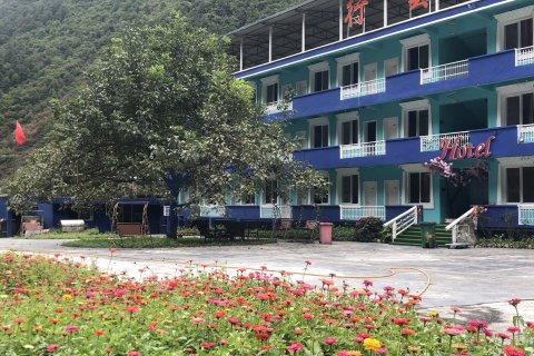 理县毕棚沟行雲主题酒店