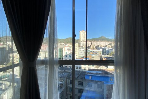 威宁阅舍轻居酒店