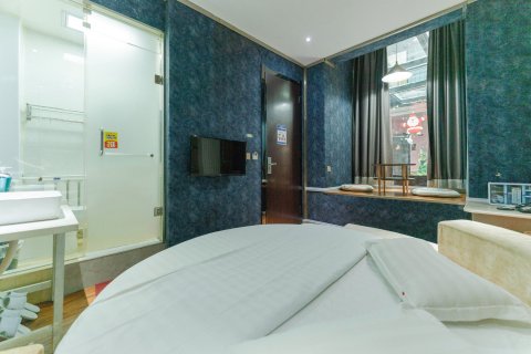 临汾唯爱精选主题公寓