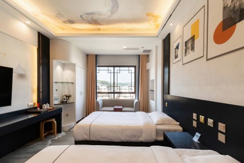 石屏云梯酒店(西山路西门农贸市场店)