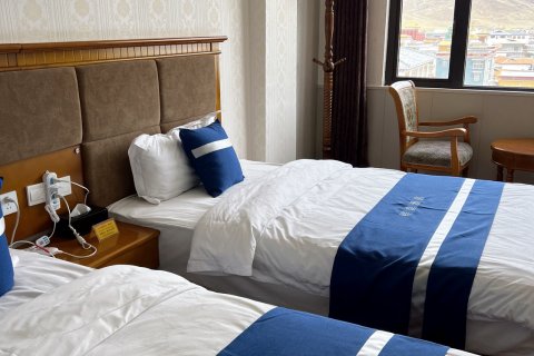 色达愿遂大酒店