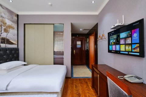 梵希印象酒店(达州城市中心广场达高中柴市街校区店)