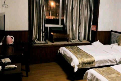 安岳柚花香商务宾馆