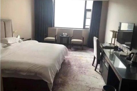 荥经鸽子花大酒店