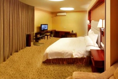 北流喜仕登商务酒店