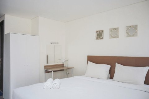 Minimalist Studio Bintaro Icon Apartment near British School By Travelio