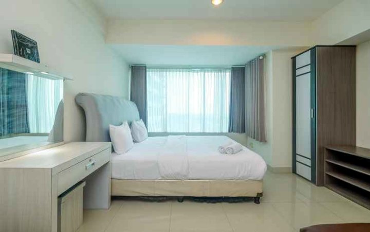 Minimalist Studio Apartment at Grand Kamala Lagoon By Travelio