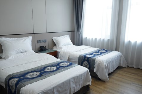 北安庆华圣乔商务大酒店