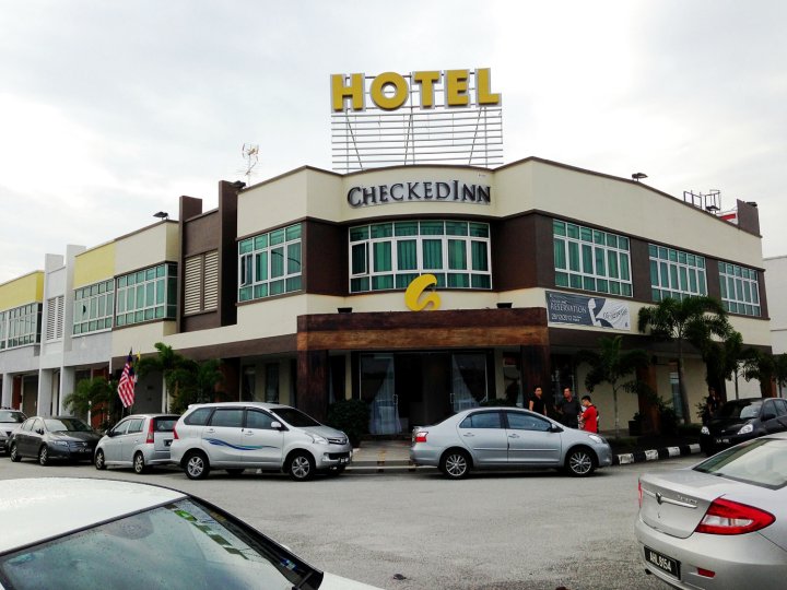 Capital O 90714 切克丁酒店(Hotel Checkedinn)