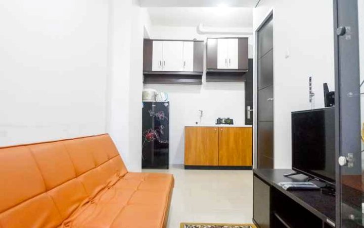 Modern 1Br Apartment at Menara Rungkut by Travelio