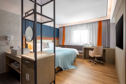 格莱登智慧酒店(万宁高铁东站华亚欢乐城店)