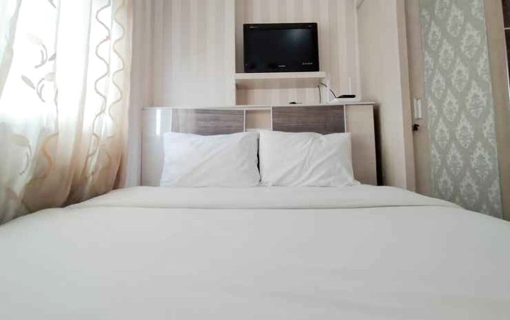 Nice and Cozy 2Br at Green Pramuka City Apartment by Travelio