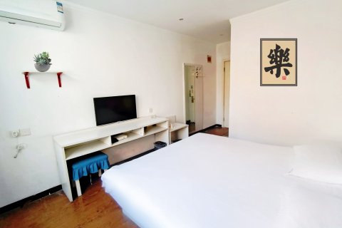 橙果主题酒店(邯郸火车站南广场店)