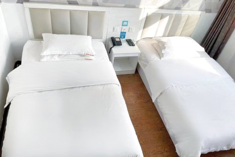 橙果主题酒店(邯郸火车站南广场店)