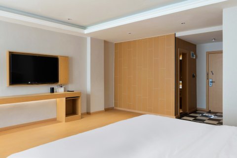 阿富尔连锁智慧酒店(沿河罗马假日店)