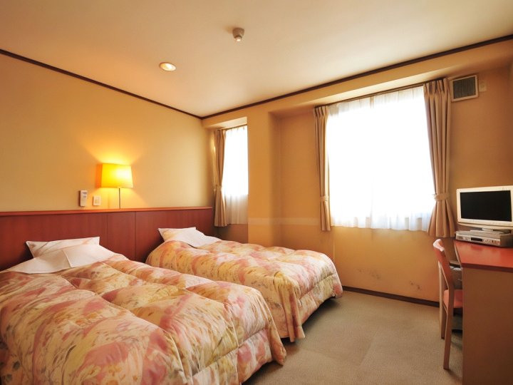 古贺岛商务酒店(Business Hotel Kogashima)