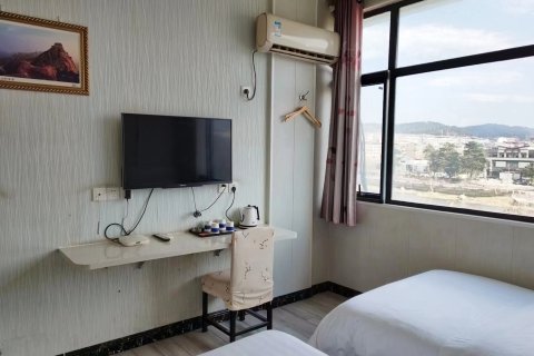 新县芳子商务宾馆