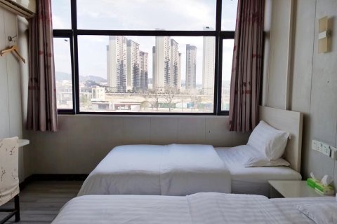 新县芳子商务宾馆