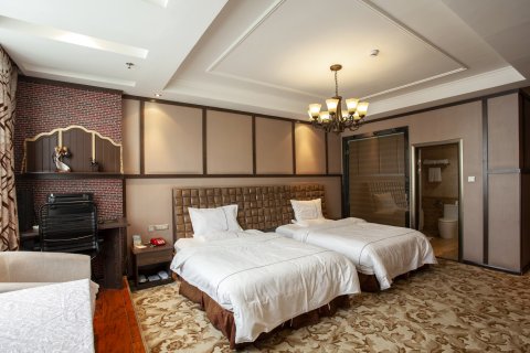 云锦酒店(库尔勒天百购物中心店)