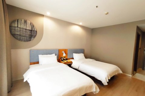 谊家酒店(广安金安大道市民广场店)