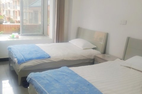 秋月龙苍沟店民宿(鸽子花大道分店)