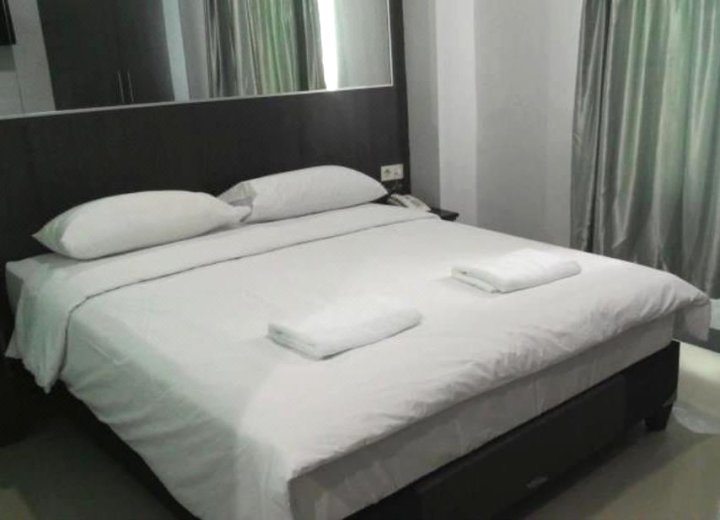 美娜多沃尔特蒙吉斯蒂1号尼达酒店(Nida Rooms Wolter Monginsidi 1 Manado)