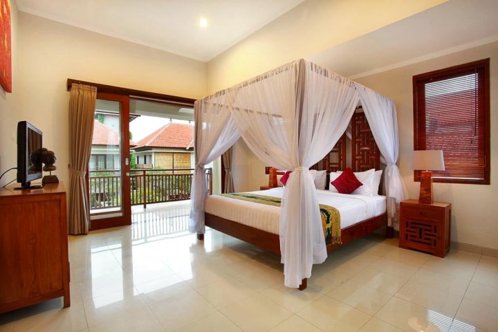 巴厘岛玛德亚别墅酒店(Madhya Villa Bali)