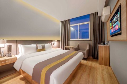 MOMO酒店(高邮文游路文游台店)