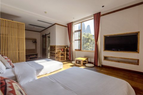 榕忆河畔小住(阳朔兴坪古镇20元人民币背景店)