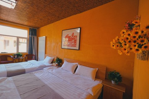 前苑后院民宿(响沙湾店)