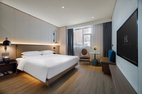 H酒店(孟州汇丰步行街景文百货店)