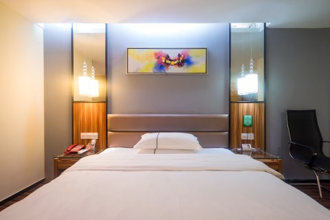 新西里酒店(北流南站店)