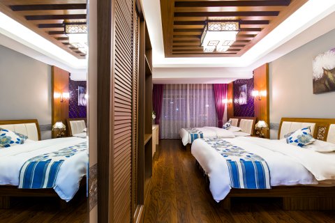 源森望江酒店(告庄星光夜市店)